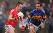 29 January 2012; Paul Kerrigan, Cork, in action against Robbie Costigan, Tipperary. McGrath Cup Football Final, Tipperary v Cork, Clonmel Sportsfield, Clonmel, Co. Tipperary. Picture credit: Stephen McCarthy / SPORTSFILE