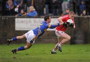29 January 2012; Paul Honohan, Cork, in action against Robbie Costigan, Tipperary. McGrath Cup Football Final, Tipperary v Cork, Clonmel Sportsfield, Clonmel, Co. Tipperary. Picture credit: Stephen McCarthy / SPORTSFILE