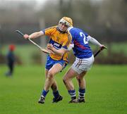 29 January 2012; Aaron Cunningham, Clare, in action against Maurice Power, Waterford Institute of Technology. Waterford Crystal Cup Hurling, Preliminary Round, Clare v Waterford Institute of Technology, O'Garney Park, Sixmilebridge, Co. Clare. Picture credit: Ray McManus / SPORTSFILE