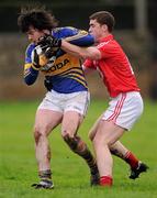 29 January 2012; Eoghan Ryan, Tipperary, in action against Fintan Goold, Cork. McGrath Cup Football Final, Tipperary v Cork, Clonmel Sportsfield, Clonmel, Co. Tipperary. Picture credit: Stephen McCarthy / SPORTSFILE