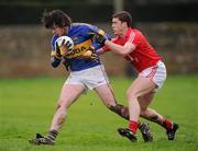 29 January 2012; Eoghan Ryan, Tipperary, in action against Fintan Goold, Cork. McGrath Cup Football Final, Tipperary v Cork, Clonmel Sportsfield, Clonmel, Co. Tipperary. Picture credit: Stephen McCarthy / SPORTSFILE