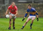 29 January 2012; Pearse O'Neill, Cork, in action against Conor Sweeney, Tipperary. McGrath Cup Football Final, Tipperary v Cork, Clonmel Sportsfield, Clonmel, Co. Tipperary. Picture credit: Stephen McCarthy / SPORTSFILE