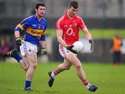 29 January 2012; Fiachra Lynch, Cork, in action against Thomas Ryan, Tipperary. McGrath Cup Football Final, Tipperary v Cork, Clonmel Sportsfield, Clonmel, Co. Tipperary. Picture credit: Stephen McCarthy / SPORTSFILE