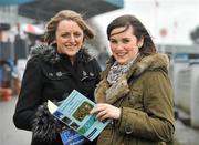 30 January 2012; Sinead Rooney, right, from Dublin, with Catherine Lennon, from Kilkenny City, study the form before the first race at the Irish National Coursing Meeting. Irish National Coursing Meeting, Powerstown Park, Clonmel, Co. Tipperary. Picture credit: David Maher / SPORTSFILE