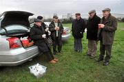 31 January 2012; Punters, from Tralee, Co. Kerry, from left to right, James Foley, Tom Foley, Denis Foley, Pat Foley, Ned Kennelly and JD Foley enjoy a cup of tea in the car park before the second day of the Irish National Coursing Meeting. Irish National Coursing Meeting, Powerstown Park, Clonmel, Co. Tipperary. Picture credit: David Maher / SPORTSFILE