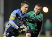31 January 2012; Alan Giles, University College Dublin, in action against Richard Dunne, Athlone Institute of Technology. Irish Daily Mail Sigerson Cup, Round 1, University College Dublin v Athlone Institute of Technology, UCD, Belfield, Dublin. Photo by Sportsfile