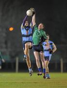 31 January 2012; Marc Coughlan, University College Dublin, in action against David Cash, Athlone Institute of Technology. Irish Daily Mail Sigerson Cup, Round 1, University College Dublin v Athlone Institute of Technology, UCD, Belfield, Dublin. Photo by Sportsfile