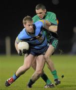 31 January 2012; Donal Kingston, University College Dublin, in action against Cathal Duignan, Athlone Institute of Technology. Irish Daily Mail Sigerson Cup, Round 1, University College Dublin v Athlone Institute of Technology, UCD, Belfield, Dublin. Photo by Sportsfile