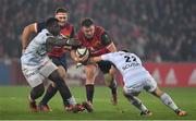 21 January 2017; Dave Kilcoyne of Munster is tackled by Cedate Gomes Sa, left, and Franck Pourteau of Racing 92 ahead of the European Rugby Champions Cup Pool 1 Round 6 match between Munster and Racing Metro 92 at Thomond Park in Limerick.  Photo by Brendan Moran/Sportsfile
