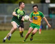 21 May 2017; Tiarnan McAteer of Antrim in action against Aaron Doherty of Donegal during the Electric Ireland Ulster GAA Football Minor Championship Quarter-Final match between Donegal and Antrim at MacCumhaill Park in Ballybofey, Co Donegal. Photo by Oliver McVeigh/Sportsfile