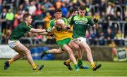 21 May 2017; Paddy Dolan of Donegal in action against John McCaffrey and Eamon Kelly of Antrim during the Electric Ireland Ulster GAA Football Minor Championship Quarter-Final match between Donegal and Antrim at MacCumhaill Park in Ballybofey, Co Donegal. Photo by Oliver McVeigh/Sportsfile