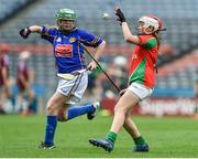 13 June 2017; Eimear Byrne of Griffith Barracks MD, Dublin, in action against Ellie Collender of Scoil Bhride GNS, Palmerstown, during the Allianz Cumann na mBunscol Finals at Croke Park in Dublin. Photo by David Maher/Sportsfile
