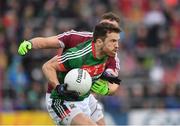 11 June 2017; Chris Barrett of Mayo in action against Michael Lundy of Galway during the Connacht GAA Football Senior Championship Semi-Final match between Galway and Mayo at Pearse Stadium, in Salthill, Galway. Photo by Ray McManus/Sportsfile