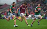 11 June 2017; Paul Conroy of Galway in action against Tom Parsons, left, and Stephen Coen of Mayo during the Connacht GAA Football Senior Championship Semi-Final match between Galway and Mayo at Pearse Stadium, in Salthill, Galway. Photo by Ray McManus/Sportsfile