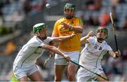 10 June 2017; Clement Cunniffe of Leitrim in action against Ian Dwyer, left, and Kelvin Magee of Warwickshire during the Lory Meagher Cup Final match between Leitrim and Warwickshire at Croke Park in Dublin. Photo by Piaras Ó Mídheach/Sportsfile