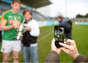 1 April 2017; Meath captain Damien Healy has his picture taken with a supporter after the Allianz Hurling League Division 2B Final match between Meath and Wicklow at Parnell Park, in Dublin. Photo by Daire Brennan/Sportsfile