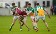 11 June 2017; James Dolan of Westmeath in action against Offaly's, from left, Seán Pender, Nigel Dunne and David Hanlon during the Leinster GAA Football Senior Championship Quarter-Final match between Offaly and Westmeath at Bord Na Móna O'Connor Park, Tullamore, in Co. Offaly. Photo by Piaras Ó Mídheach/Sportsfile