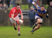 29 January 2012; Paul Kerrigan, Cork, in action against Ciaran McDonnell, Tipperary. McGrath Cup Football Final, Tipperary v Cork, Clonmel Sportsfield, Clonmel, Co. Tipperary. Picture credit: Stephen McCarthy / SPORTSFILE
