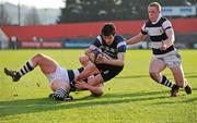 1 February 2012; Nigel Kerr, Cresent CC, goes over to score his side's first try despite the tackles of Seamus Glynn, left, and Cian Murphy, PBC. Avonmore Munster Schools Rugby Senior Cup, Round 1, PBC v Cresent CC, Musgrave Park, Cork. Picture credit: Matt Browne / SPORTSFILE