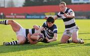 1 February 2012; Nigel Kerr, Cresent CC, goes over to score his side's first try despite the tackles of Seamus Glynn, left, and Cian Murphy, PBC. Avonmore Munster Schools Rugby Senior Cup, Round 1, PBC v Cresent CC, Musgrave Park, Cork. Picture credit: Matt Browne / SPORTSFILE