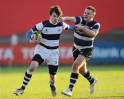 1 February 2012; Josh Barrett, PBC, is tackled by Greg Barry, Cresent CC. Avonmore Munster Schools Rugby Senior Cup, Round 1, PBC v Cresent CC, Musgrave Park, Cork. Picture credit: Matt Browne / SPORTSFILE