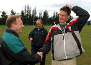 13 June 2002; David Wallace, right, shakes hands with Ireland head coach Eddie O'Sullivan, left, after arriving from the USA as back up for Eric Miller and Alan Quinlan, during an Ireland Rugby Squad Training Session at Peter Johnstone Park in Mosgiel, Otago, New Zealand. Photo by Matt Browne/Sportsfile