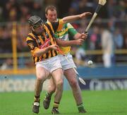 9 June 2002; Noel Hickey of Kilkenny in action against John Ryan of Offaly during the Guinness Leinster Senior Hurling Championship Semi-Final match between Kilkenny and Offaly at Semple Stadium in Thurles, Tipperary. Photo by Ray McManus/Sportsfile