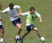 14 June 2002; Steve Finnan, right, and Niall Quinn during a Republic of Ireland training session at Sangok-dong Military Sports Facility in Seoul, South Korea. Photo by David Maher/Sportsfile