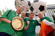 14 June 2002; Republic of Ireland supporters, from left, Clive and Ollie Martin, from Drogheda, Fergal Gartlan, from Galway, and Ciaran McDonnell from Monaghan, at Seoul City Hall, to watch the the FIFA World Cup 2002 Group D match between Portugal and South Korea. Photo by David Maher/Sportsfile