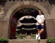 14 June 2002; Robbie Keane relaxes at the Korean Gardens of the Westin Chosun Hotel in Seoul following a Republic of Ireland training session. Photo by David Maher/Sportsfile