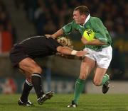 15 June 2002; John Kelly of Ireland is tackled by New Zealand's Justin Marshall during the Summer Tour 2002 1st Test match between New Zealand and Ireland at Carisbrook in Dunedin, Otago, New Zealand. Photo by Matt Browne/Sportsfile