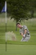 15 June 2002; David Jones of Northern Ireland chips out of a bunker at the eighth green during day two of the Irish Amateur Close Championship at Carlow Golf Club in Deerpark, Carlow. Photo by Brendan Moran/Sportsfile