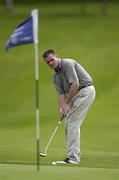 15 June 2002; John McGinn of Louth putts from just off the eighth green during day two of the Irish Amateur Close Championship at Carlow Golf Club in Deerpark, Carlow. Photo by Brendan Moran/Sportsfile