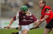 15 June 2002; Fergal Healy of Galway in action against Liam Clarke of Down during the Guinness All-Ireland Senior Hurling Championship Qualifing Round 1 match between Galway and Down at Casement Park in Belfast. Photo by Damien Eagers/Sportsfile