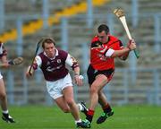 15 June 2002; Michael Pucci of Down in action against Rory Gantley of Galway during the Guinness All-Ireland Senior Hurling Championship Qualifing Round 1 match between Galway and Down at Casement Park in Belfast. Photo by Damien Eagers/Sportsfile