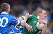 15 June 2002; John Quane of Limerick in action against Cavan's Jason Reilly during the Bank of Ireland All-Ireland Senior Football Championship Qualifier Round 1 Replay match between Cavan and Limerick at Breffni Park in Cavan. Photo by Aoife Rice/Sportsfile