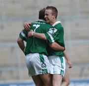 15 June 2002; Michael Reidy, right, and Damien Reidy of Limerick celebrate following their side's victory during the Bank of Ireland All-Ireland Senior Football Championship Qualifier Round 1 Replay match between Cavan and Limerick at Breffni Park in Cavan. Photo by Aoife Rice/Sportsfile