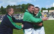 15 June 2002; Limerick players, from left, Sean Kelly, Tom Mac Loughlin and Jason Stokes celebrate following their side's victory during the Bank of Ireland All-Ireland Senior Football Championship Qualifier Round 1 Replay match between Cavan and Limerick at Breffni Park in Cavan. Photo by Aoife Rice/Sportsfile