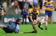 15 June 2002; Colin Lynch of Clare in action against Tommy Moore of Dublin during the Guinness All-Ireland Senior Hurling Championship Qualifying Round 1 match between Clare and Dublin at Parnell Park in Dublin. Photo by Ray McManus/Sportsfile