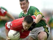 16 June 2002; Conor Brosnan of Cork is tackled by Derek McNamara of Kerry during the Bank of Ireland Munster Senior Football Championship Semi-Final match between Kerry and Cork at Fitzgerald Stadium in Killarney, Kerry. Photo by Brendan Moran/Sportsfile