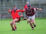 15 June 2002; Damien Hayes of Galway in action against Paddy Coulter of Down during the Guinness All-Ireland Senior Hurling Championship Qualifing Round 1 match between Galway and Down at Casement Park in Belfast. Photo by Damien Eagers/Sportsfile