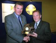 15 June 2002; Clare County PRO Des Crowe, right, is presented with the GAA MacNamee Award for Best County Final Programme by Uachtarán Chumann Lúthchleas Gael Seán McCague during the GAA MacNamee Awards at the Burlington Hotel in Dublin. Photo by Ray McManus/Sportsfile