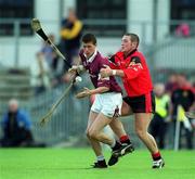 15 June 2002; Cathal Connolly of Galway in action against Jermoe Trainor of Down during the Guinness All-Ireland Senior Hurling Championship Qualifing Round 1 match between Galway and Down at Casement Park in Belfast. Photo by Damien Eagers/Sportsfile