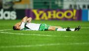 16 June 2002; Robbie Keane of Republic of Ireland holds his head in his hands following his side's defeat during their FIFA World Cup 2002 Round of 16 match against Spain at Suwon World Cup Stadium in Suwon, South Korea. Photo by David Maher/Sportsfile