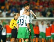 16 June 2002; David Connolly of Republic of Ireland is consoled by team-mate Niall Quinn after he had missed a penalty during the shoot out in the FIFA World Cup 2002 Round of 16 match between Spain and Republic of Ireland at Suwon World Cup Stadium in Suwon, South Korea. Photo by David Maher/Sportsfile