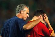 16 June 2002; Republic of Ireland manager Mick McCarthy consoles Matt Holland following their side's defeat during the FIFA World Cup 2002 Round of 16 match between Spain and Republic of Ireland at Suwon World Cup Stadium in Suwon, South Korea. Photo by David Maher/Sportsfile