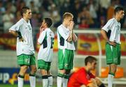16 June 2002; Republic of Ireland players, from left, Kevin Kilbane, Mark Kinsella, Damien Duff and Niall Quinn following their side's defeat during the FIFA World Cup 2002 Round of 16 match between Spain and Republic of Ireland at Suwon World Cup Stadium in Suwon, South Korea. Photo by David Maher/Sportsfile