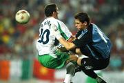 16 June 2002; Robbie Keane of Republic of Ireland in action against Iker Casillas of Spain during the FIFA World Cup 2002 Round of 16 match between Spain and Republic of Ireland at Suwon World Cup Stadium in Suwon, South Korea. Photo by David Maher/Sportsfile