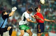 16 June 2002; Niall Quinn of Republic of Ireland in action against Fernando Hierro, right, and Iker Casillas of Spain during the FIFA World Cup 2002 Round of 16 match between Spain and Republic of Ireland at Suwon World Cup Stadium in Suwon, South Korea. Photo by David Maher/Sportsfile