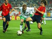 16 June 2002; Damien Duff of Republic of Ireland in action against Carles Puyol, right, and Fernando Hierro of Spain during the FIFA World Cup 2002 Round of 16 match between Spain and Republic of Ireland at Suwon World Cup Stadium in Suwon, South Korea. Photo by David Maher/Sportsfile